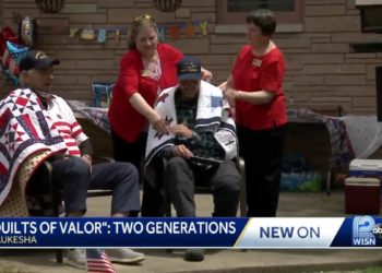 World War II veteran, grandson given quilts of valor