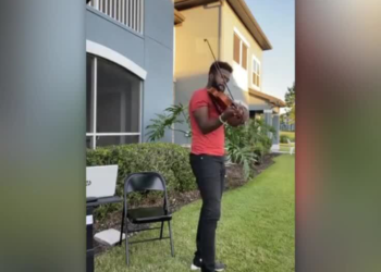 Local family brings joy to neighbors stuck inside through music