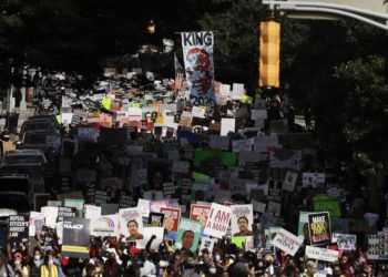 The Latest: President Trump says police treated unfairly | Nation/World News