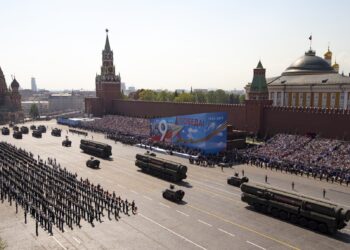 Putin uses World War II parade to boost support before vote