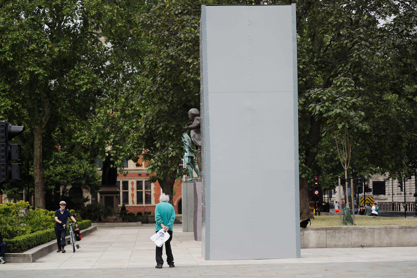 Winston Churchill statue boarded up, as British culture wars sideline Nigel Farage and ‘Fawlty Towers’