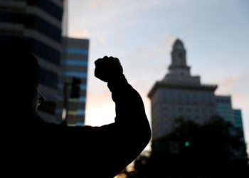 Kaiser health care workers in East Bay stage walkout, take a knee in support of protesters