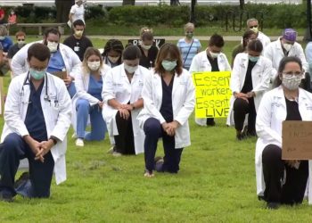 Healthcare workers hold ‘White Coats for Black Lives’ rally