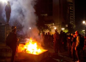 Federal officers detain Portland protesters in unmarked vans