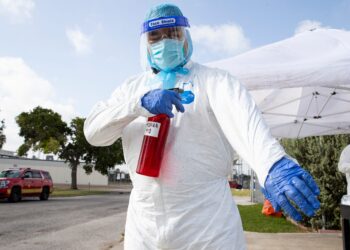 Florida counties impose curfews as cases surge in state