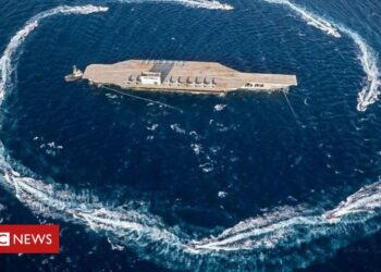 Iran blasts dummy US aircraft carrier with missiles