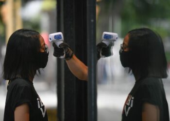 The Latest: China Reports 46 New Cases on Opposite Ends | World News