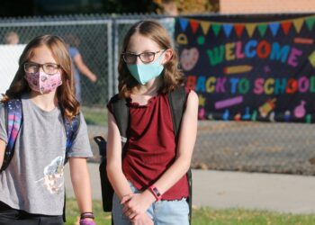 WHO says young people drive pandemic; herd immunity far