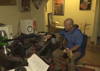 Topeka man uses talent to help others through therapeutic music