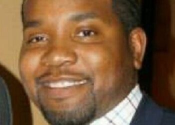 Friends, family mourn educator at site of Detroit slaying