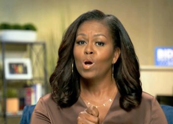 Michelle Obama VOTE necklace goes viral in speech about voting