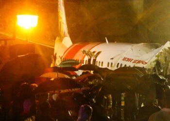 Flight skids off runway; 18 people dead