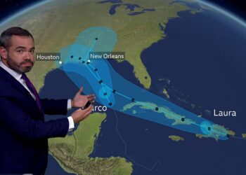 Thousands evacuated as two storms head for southern US