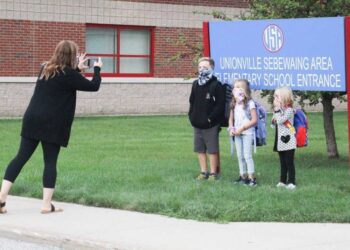 USA staff helping students adjust to pandemic changes