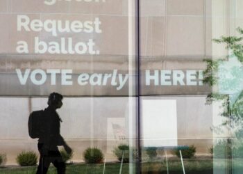 Two conservative political operatives charged with misleading voter robocalls