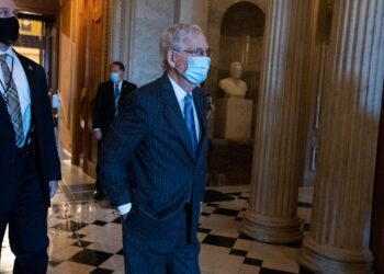 McConnell says nothing wrong with health after photos show bruises on hands