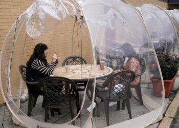 Chicago curfew; Louisiana football; Wyoming 10K cases