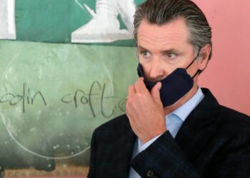 Newsom bemoans attending dinner party; state discourages travel