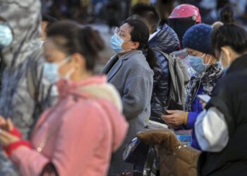 The Latest: Nebraska COVID cases surge; strain health care | Business