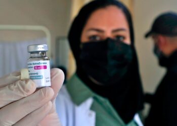 40 million vaccine doses either awaiting use or wasted