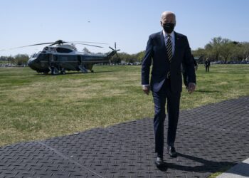 Biden points to China in development push