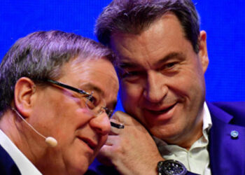 Meet the two men in tug-of-war for Merkel mantle